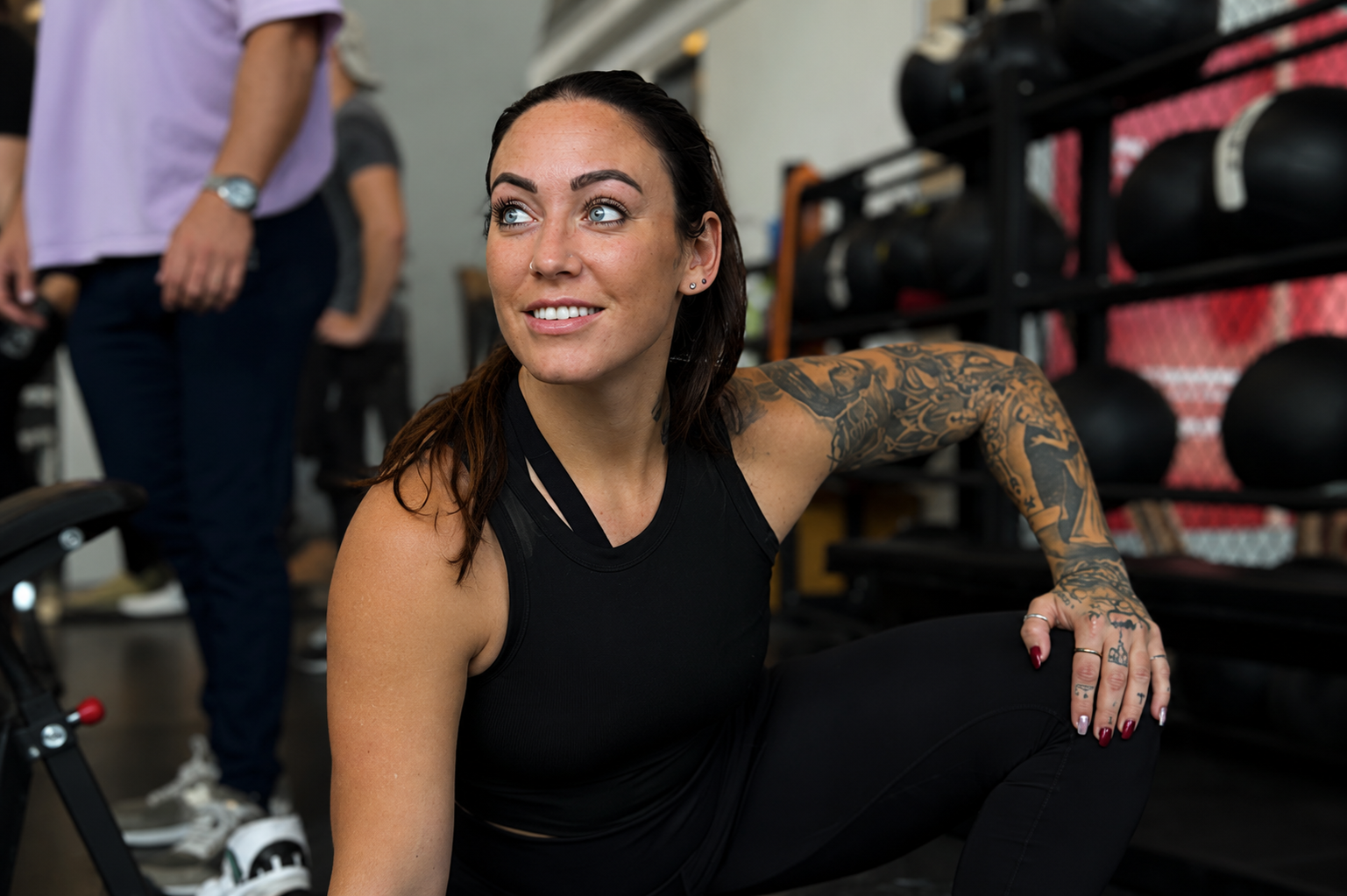 Suzanne Woodward coaching strength training in the gym